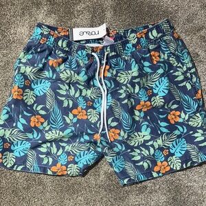 Vibrant Blue and Orange Swim Trunks with Tropical Print